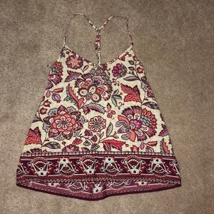 Floral tank top with a cross back